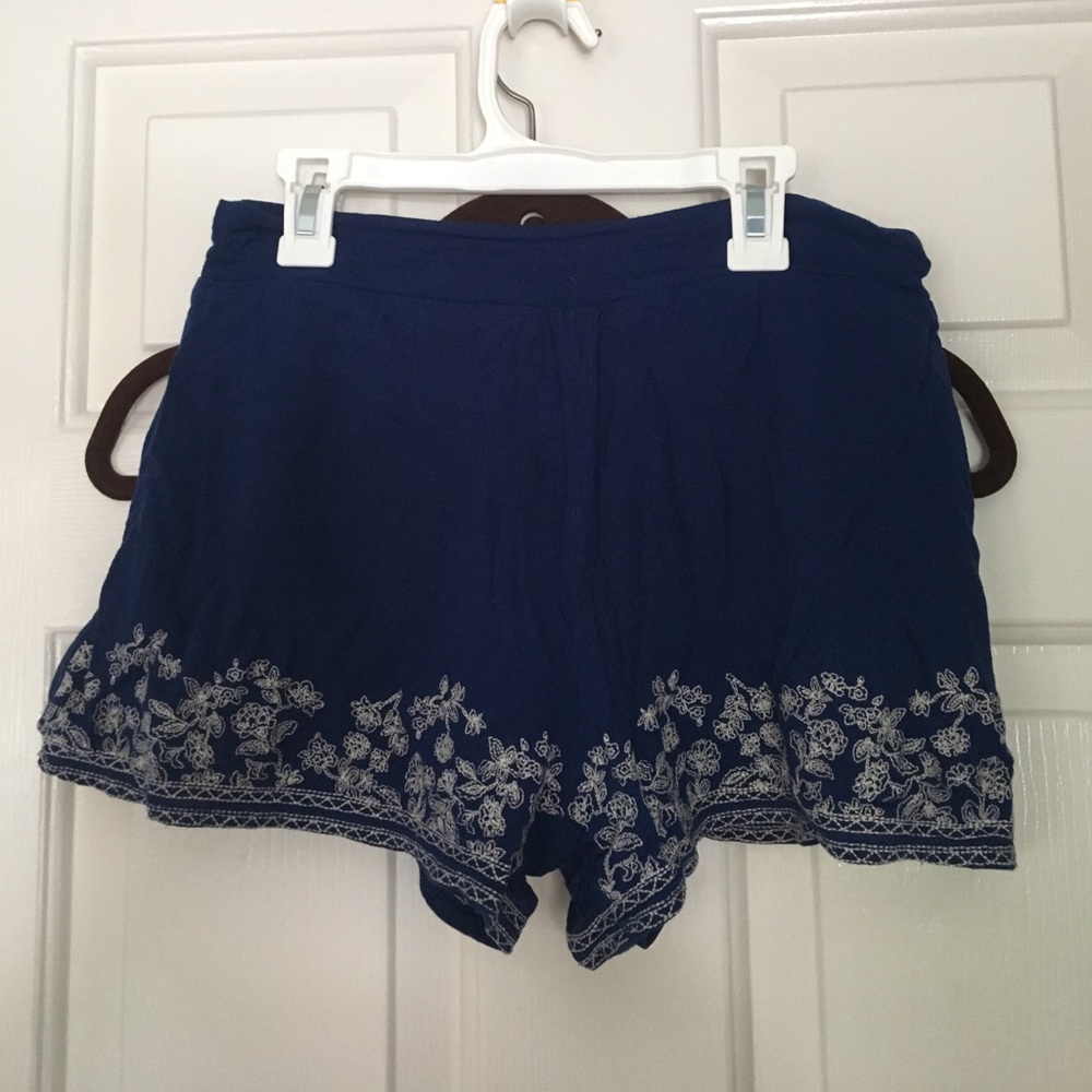 Flowy floral royal blue shorts.