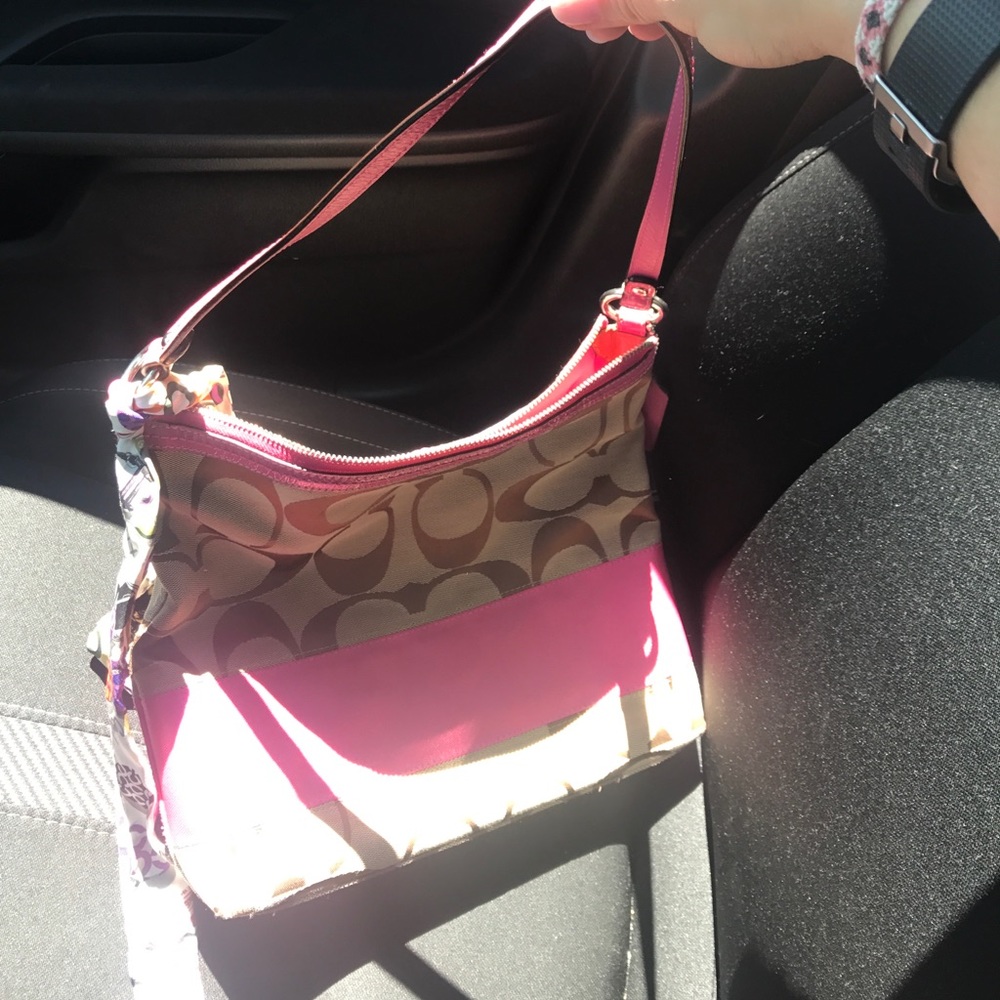 Coach purse with ribbon