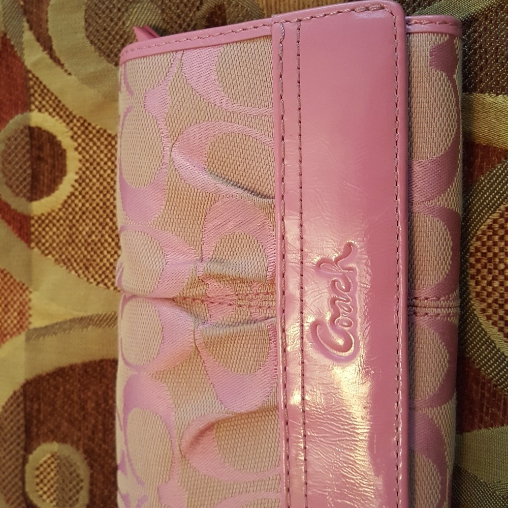 Pink and tan coach wallet
