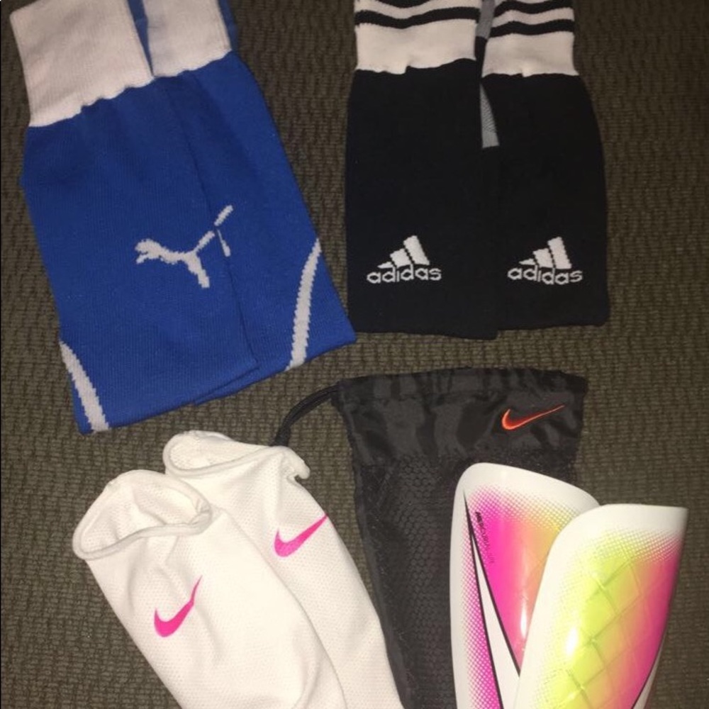 Adidas and Puma soccer socks, Nike shin guards