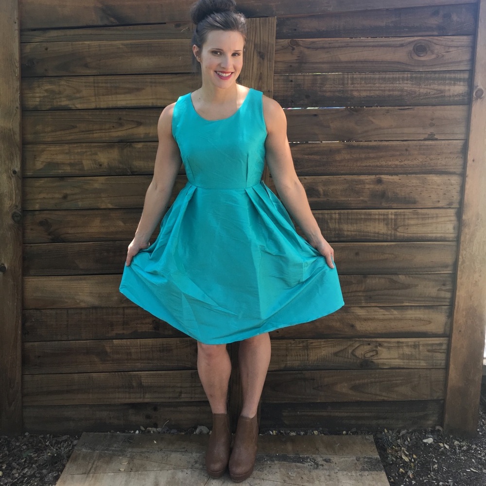 Teal shimmery dress with pockets