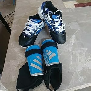 Soccer cleats and shin gaurd