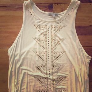 Fun & flirty white tunic tank with gold detail! ✨