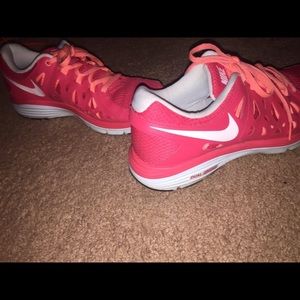 Women's pink Nike shoes