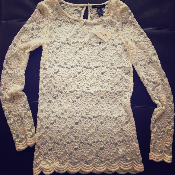 Long sleeved cream laced top. - Picture 1 of 3