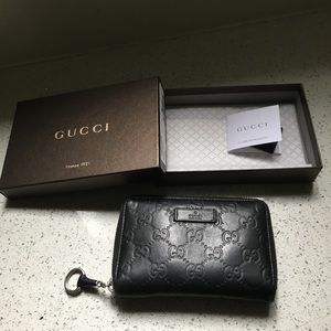 Black Gucci guccisima leather zip wallet