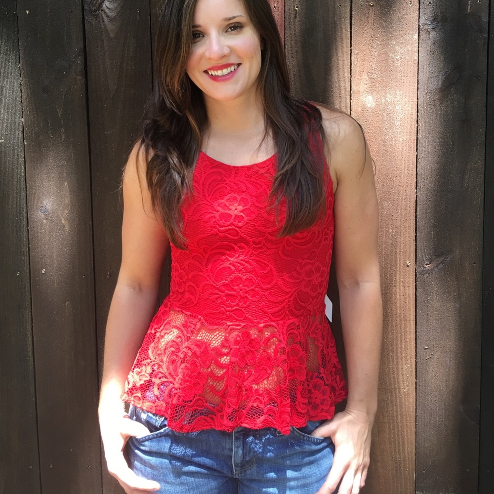 Lacey red peplum top with transparent back