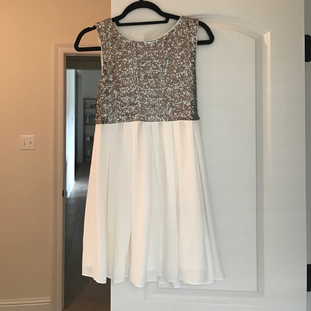 Sequined and white cocktail dress