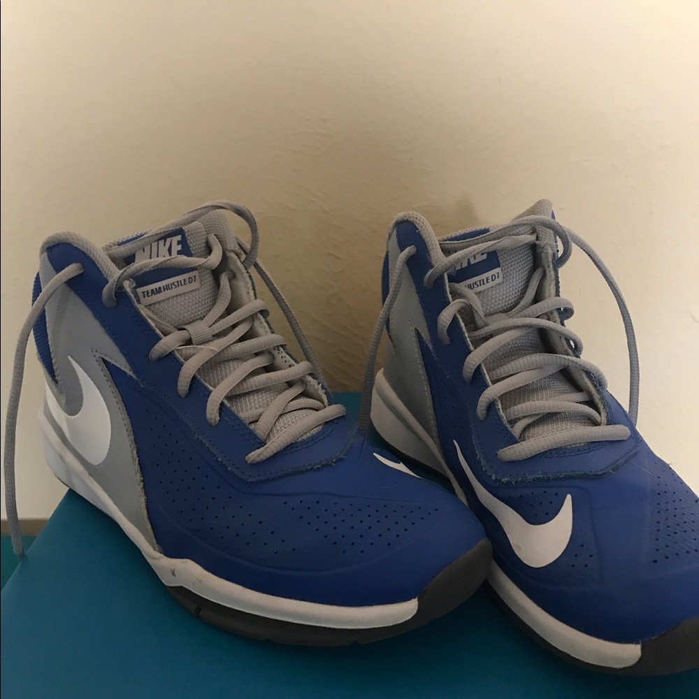 Boys blue and white Nike basketball shoes