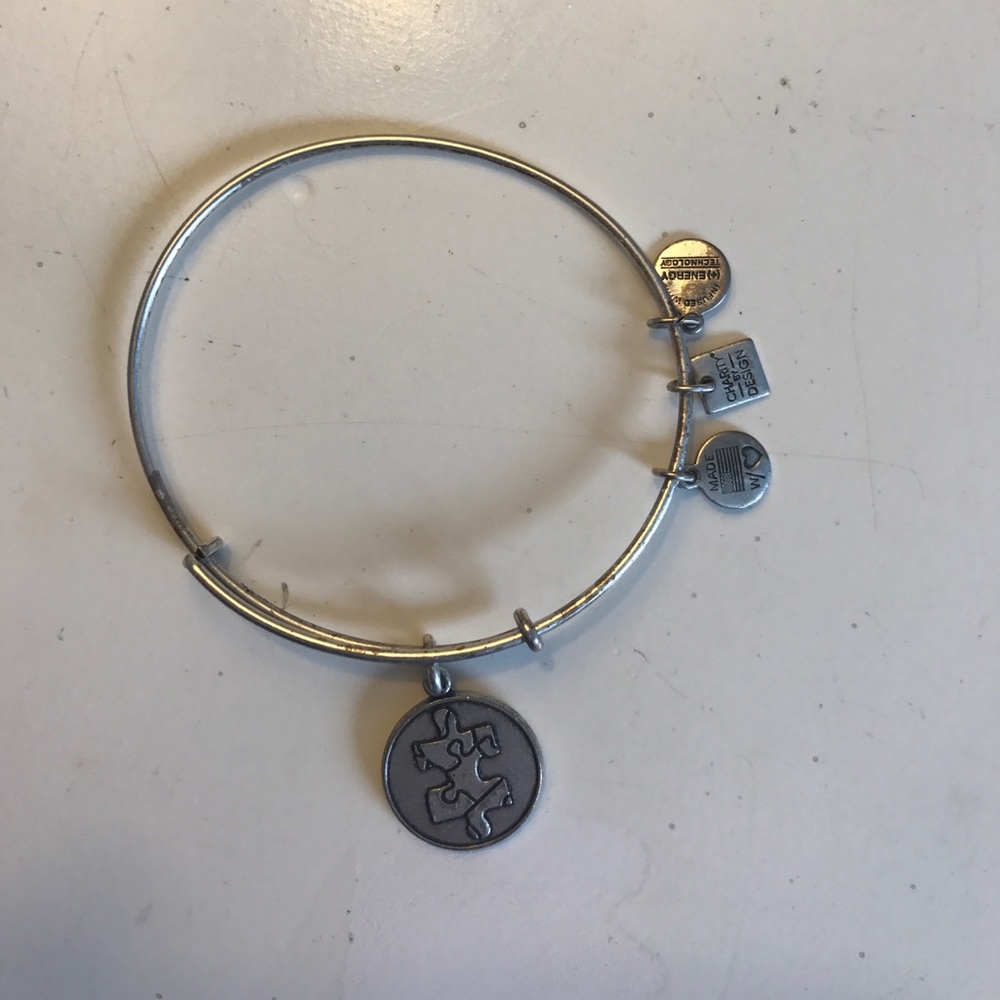 Authentic Alex and Ani bracelet with puzzle piece