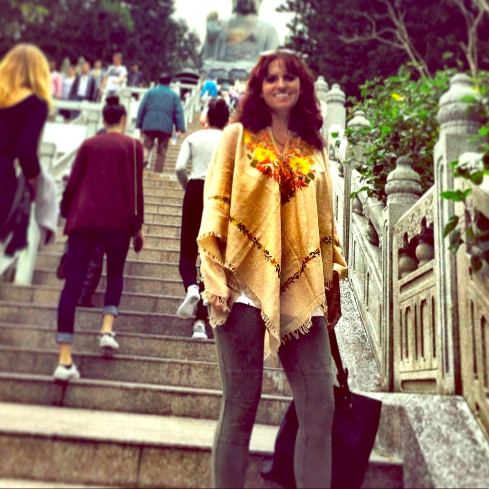 Tan embroidered poncho.