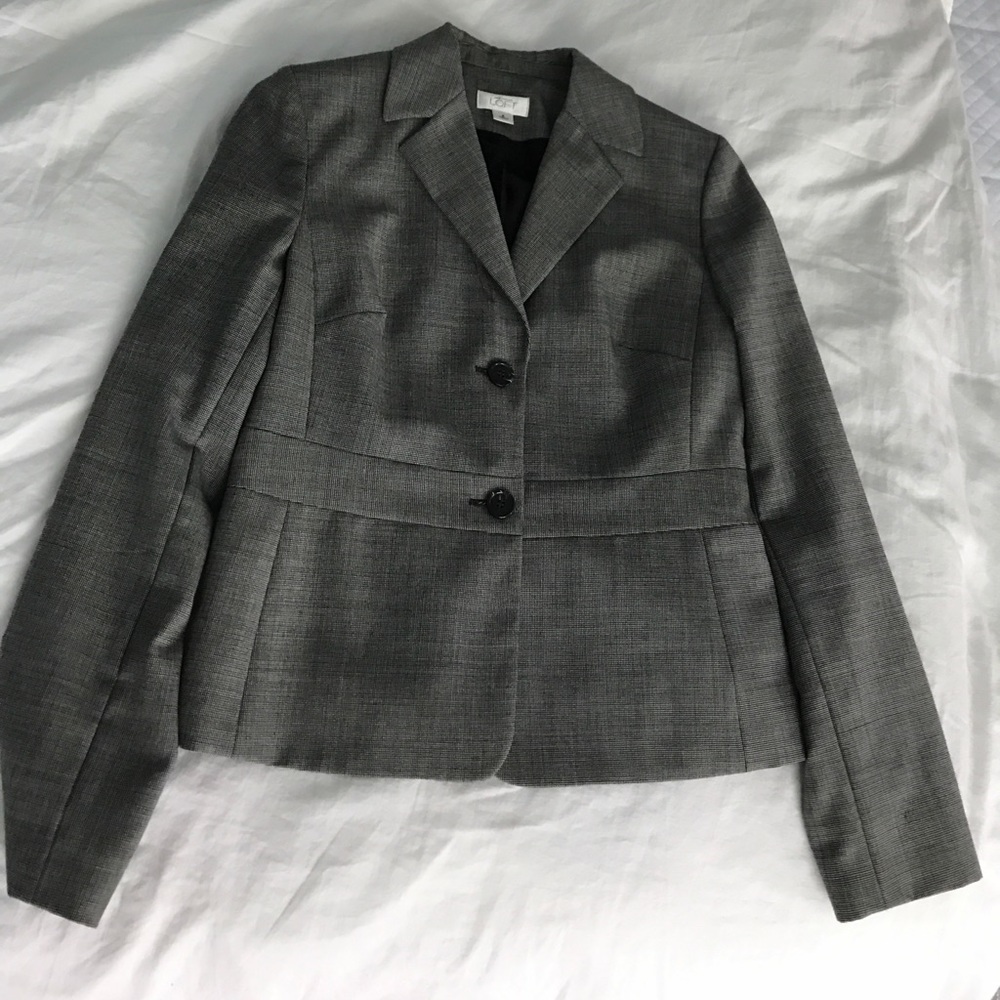 Checkered black and white tapered jacket.