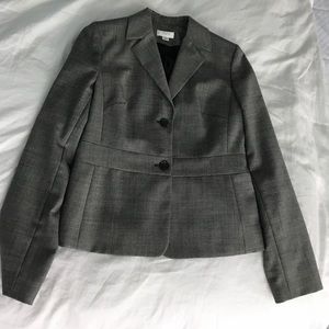 Checkered black and white tapered jacket.