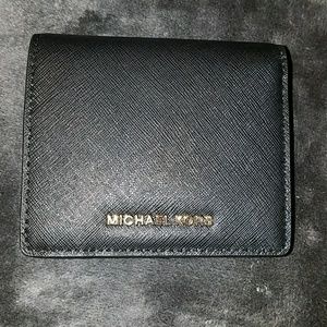 Michael Kors black jet set carry all