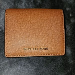 Michael Kors light brown jet set carry all