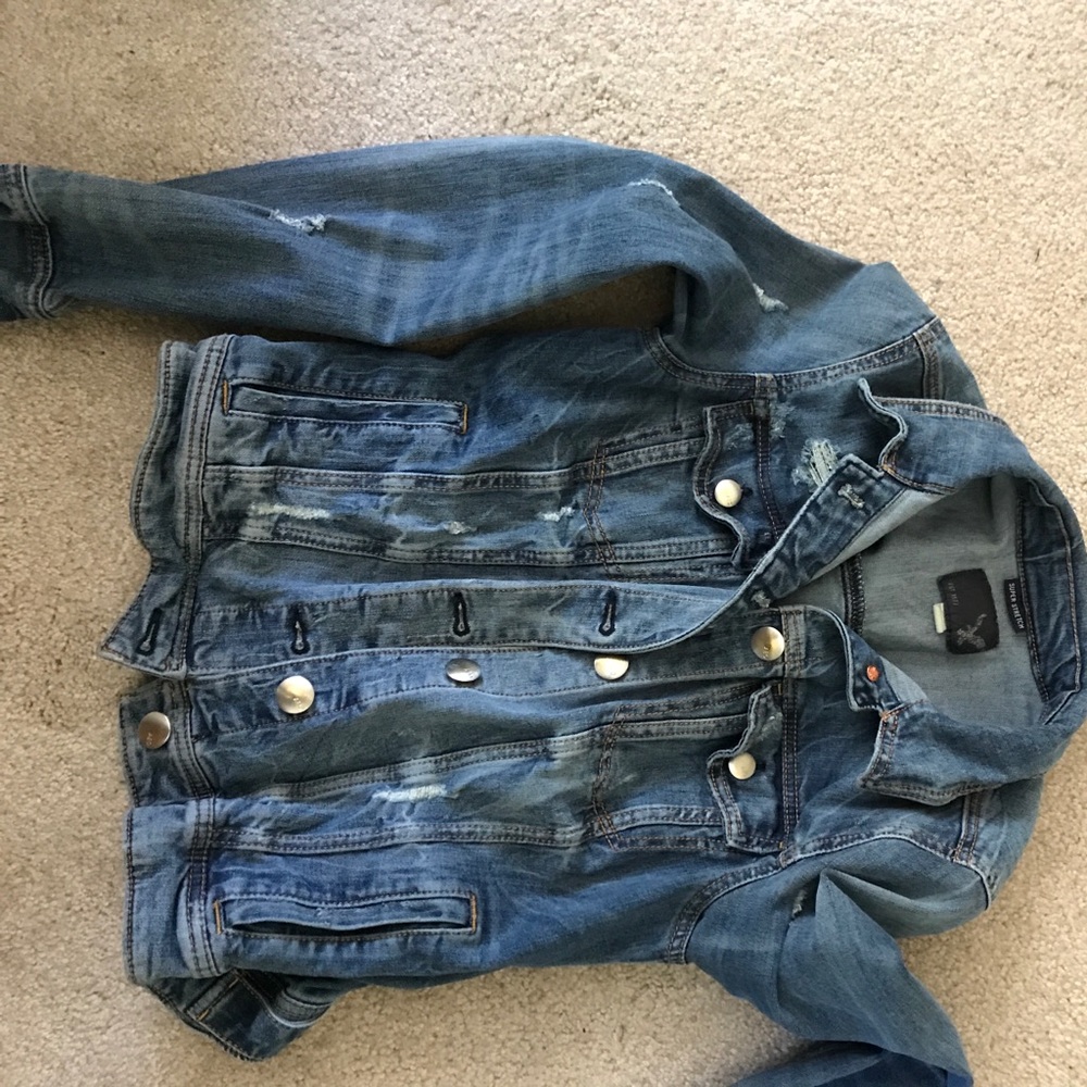 Distressed jean jacket