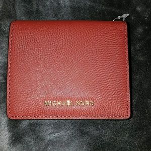 Michael Kors red jet set carry all case