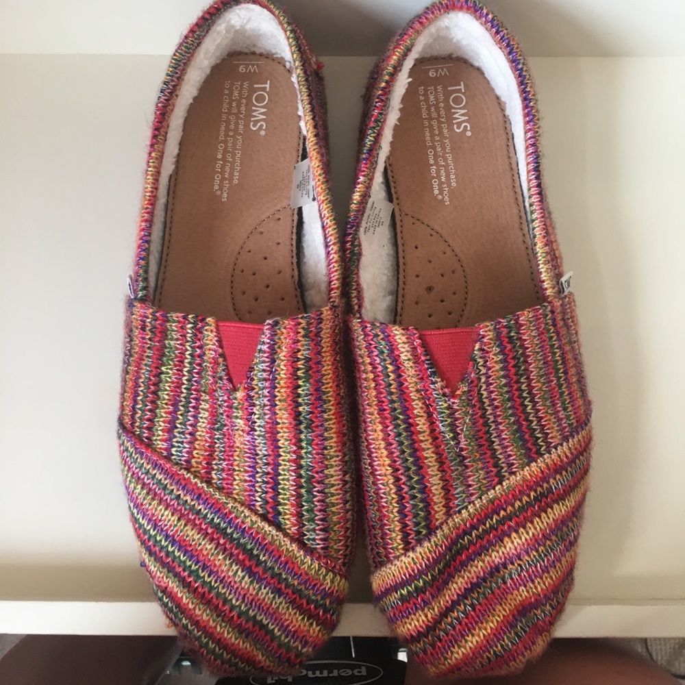 Multi colored Tom's slip ons