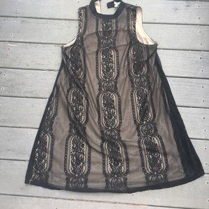 Little black dress with a twist of lace