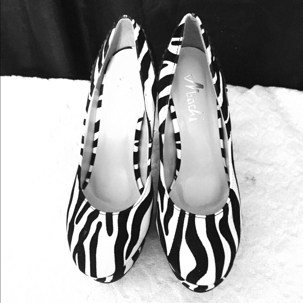 Zebra print platform pumps