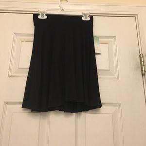 High waisted black flowy skirt