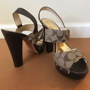 Classic Coach logo wooden high heel shoe.