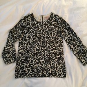 Black and white patterned crew neck sweater