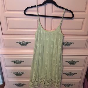 Nude swing dress with detail