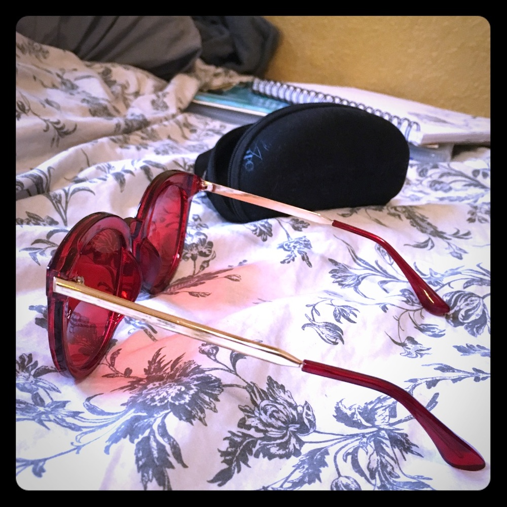Red tinted sunglasses with case