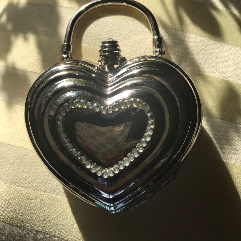 Silver heart shape evening bag.