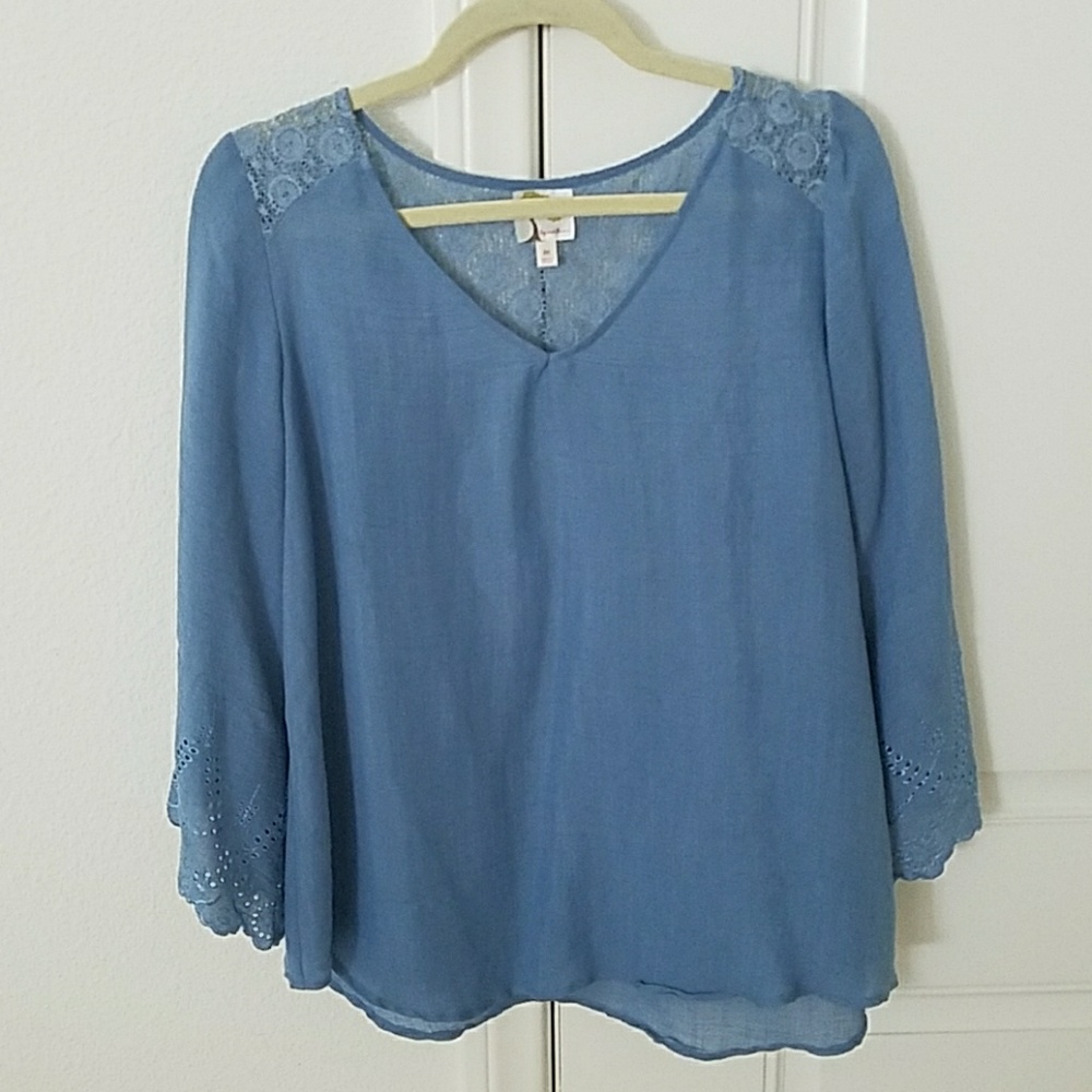 Fig and Flower peasant top with crochet detailing.