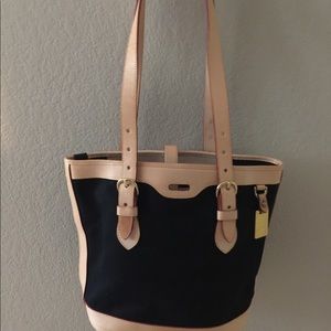 Dooney and Bourke black canvas with tan leather