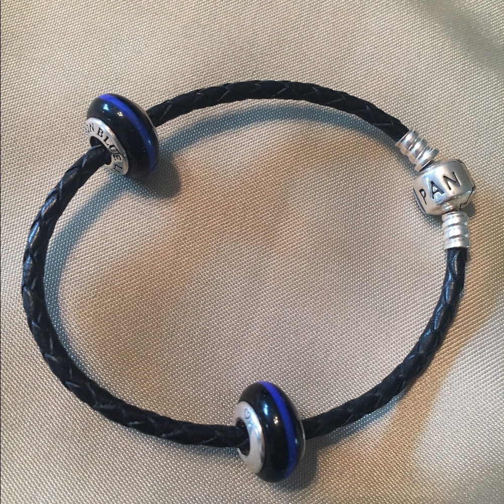 Pandora bracelet, two police support beads.