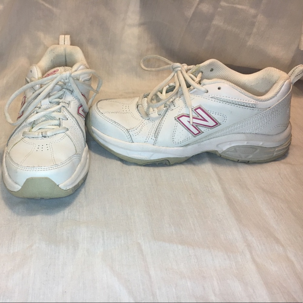 New balance 608 sneakers. With pink detail
