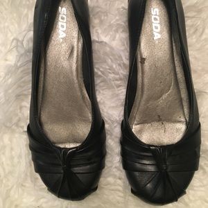 Black Flats with rubber sole.