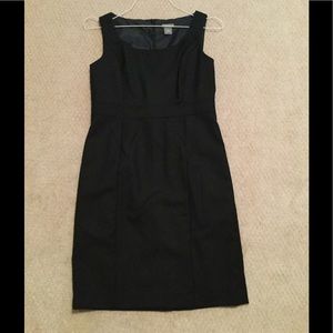 Black knee length sleeveless dress