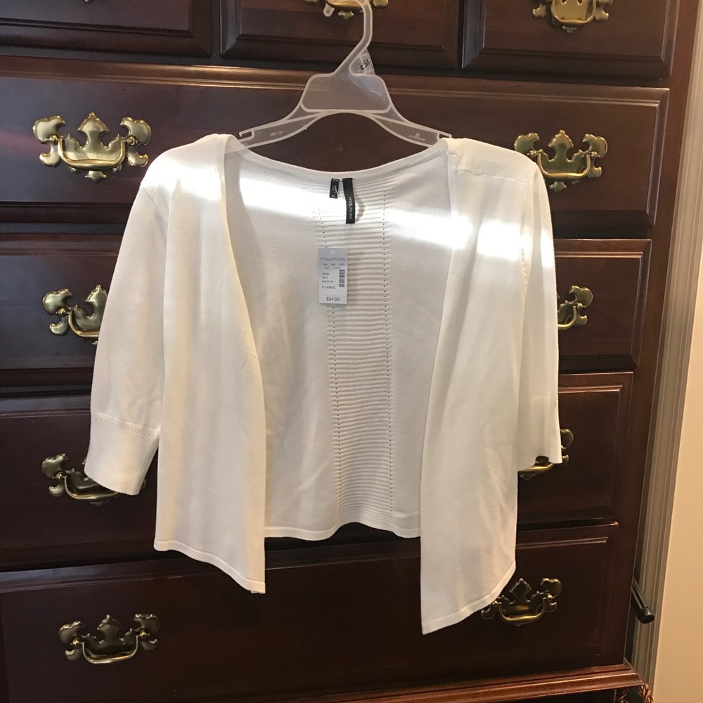 Maurice's white cardigan