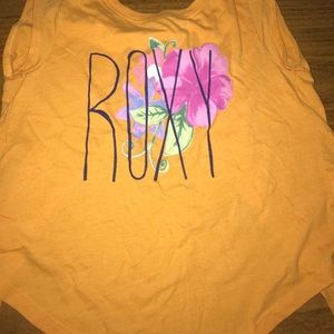 Orange open back flora tee shirt