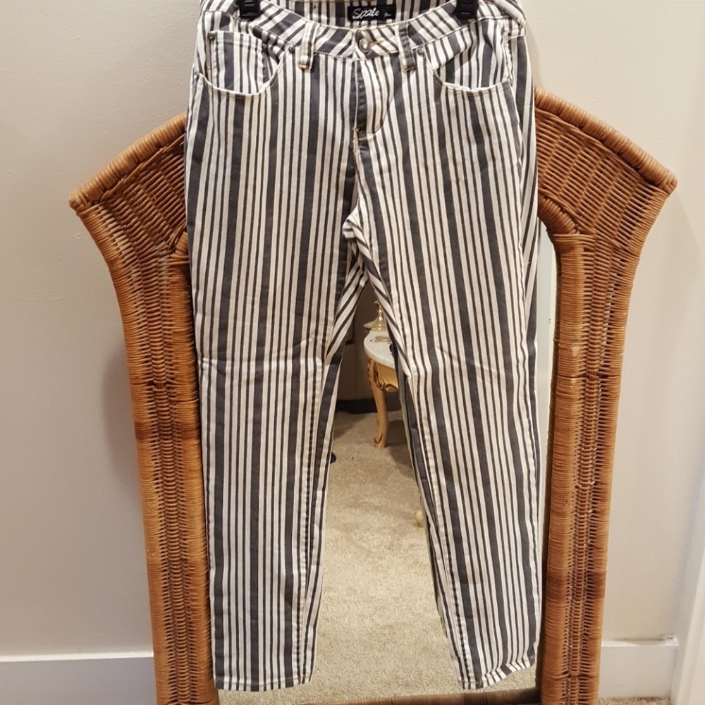 Sizzle gray and white stripe slim cut jeans.
