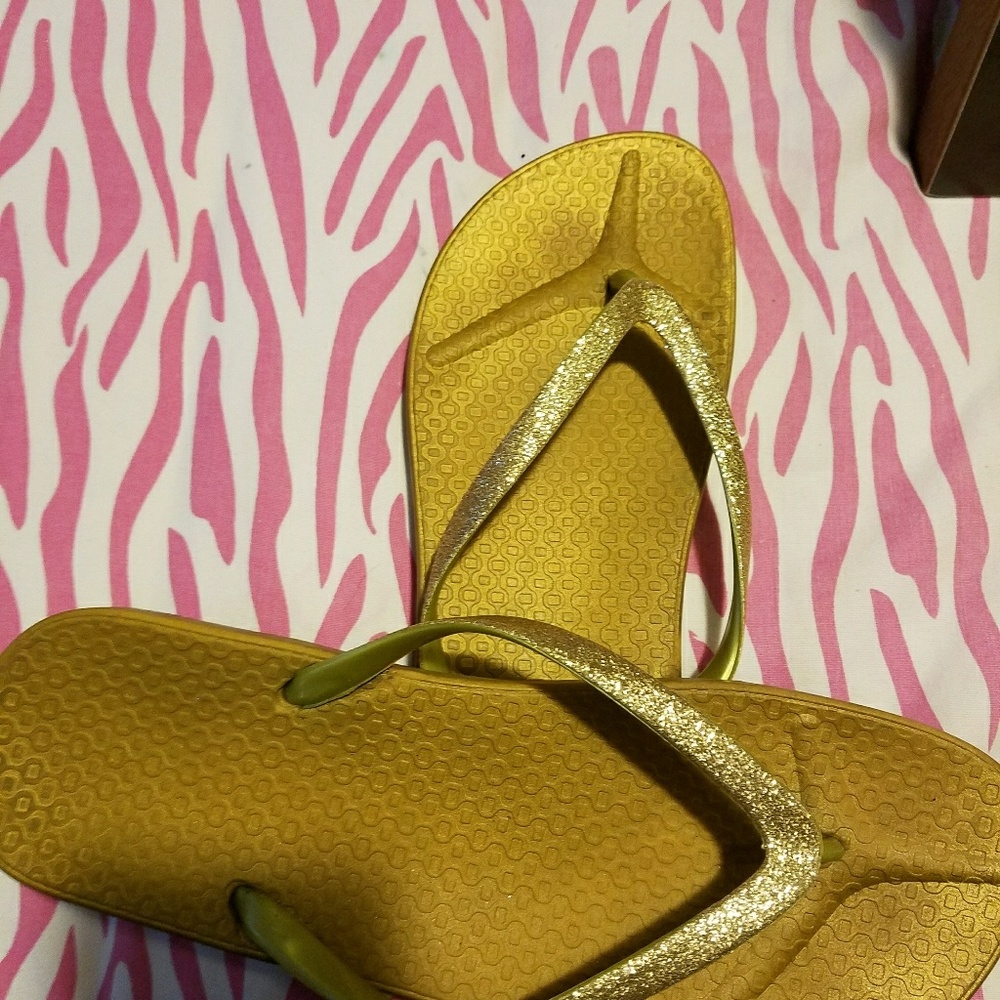 Gold flip flops
