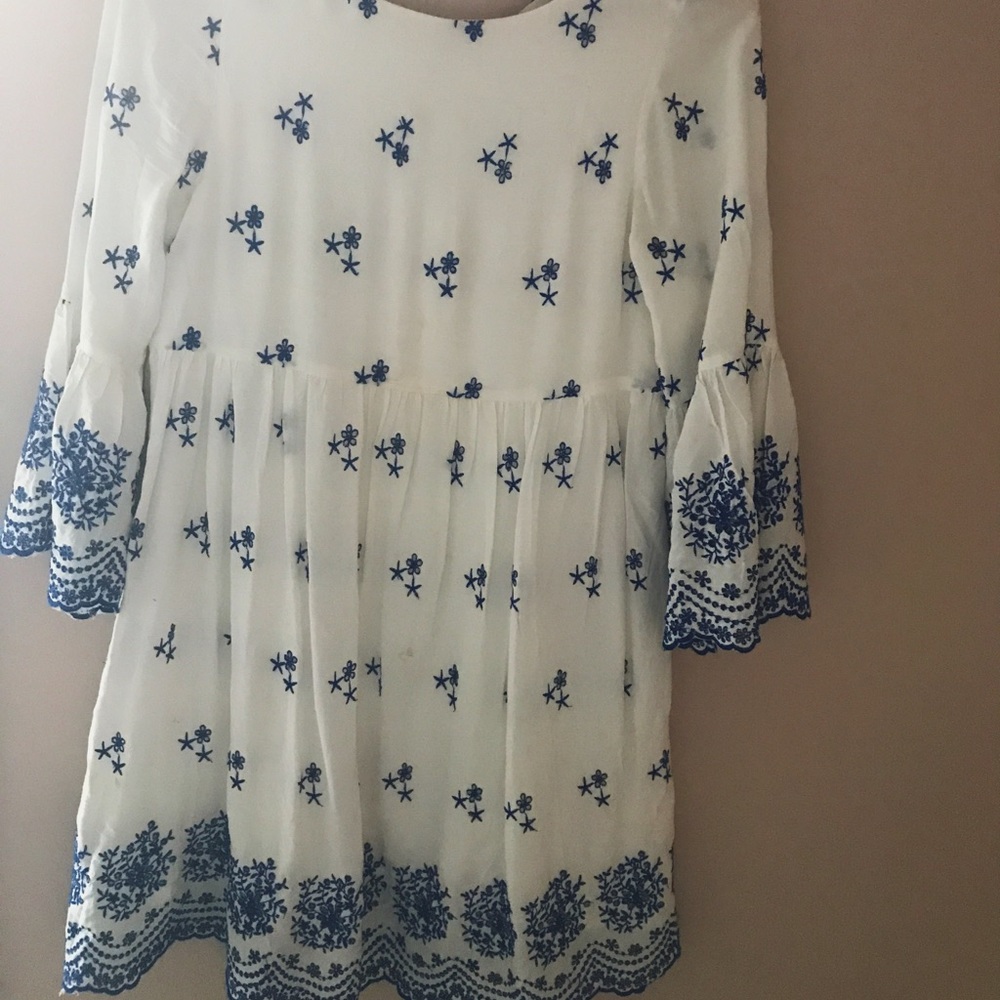 Scooped neck embroidered dress