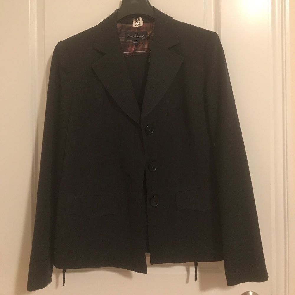 Black suit with light pin stripes.