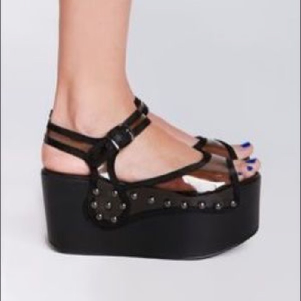 Ego and Greed crossover sandals