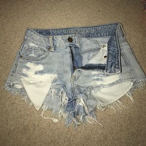 Destroyed high rise jean shorts