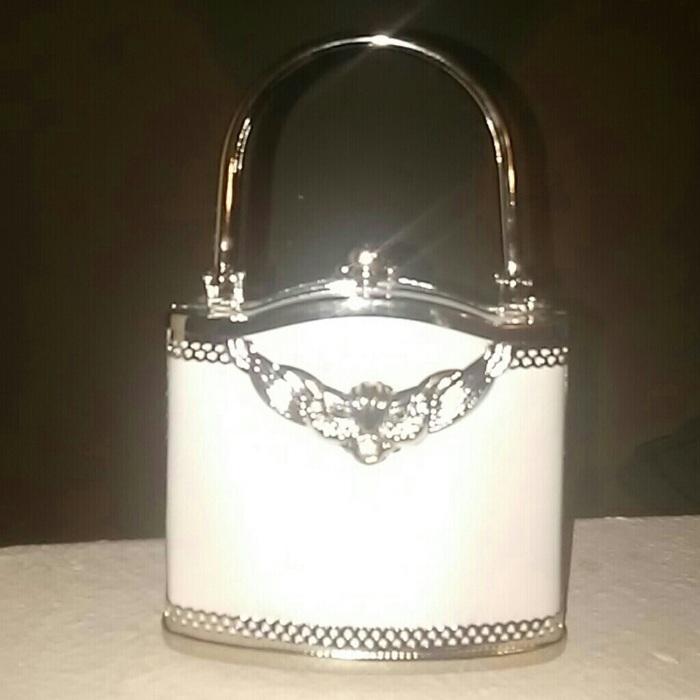 Trinket purse with silver trim