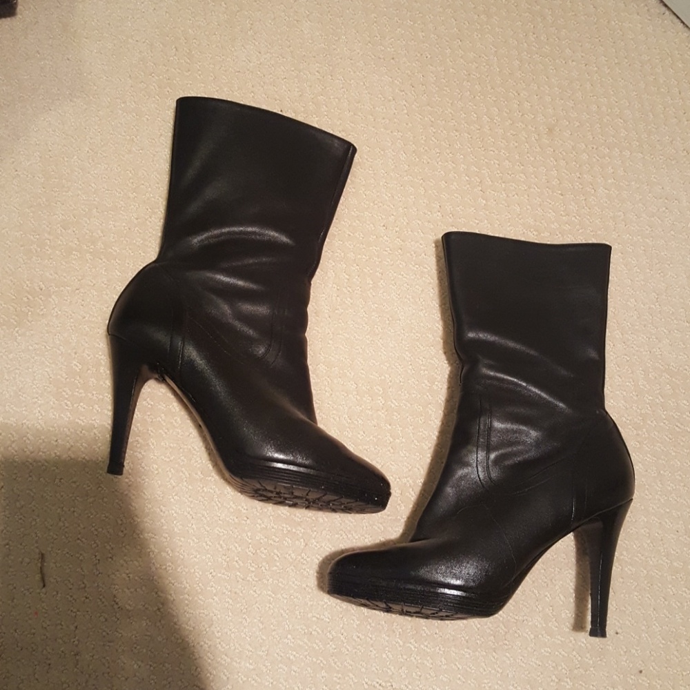 Mid calf Calvin Klein boots. Well loved!