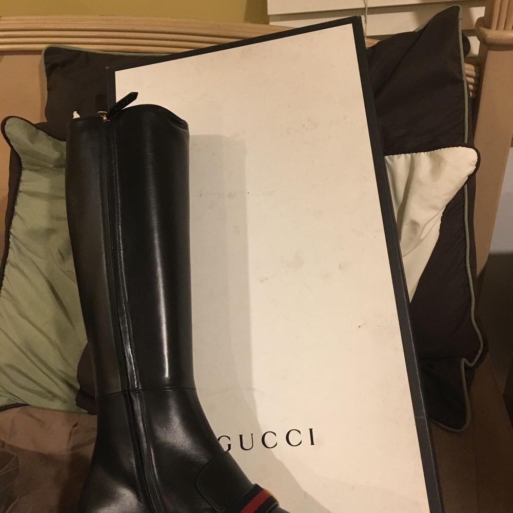 Gucci boots never been worn. Size 9