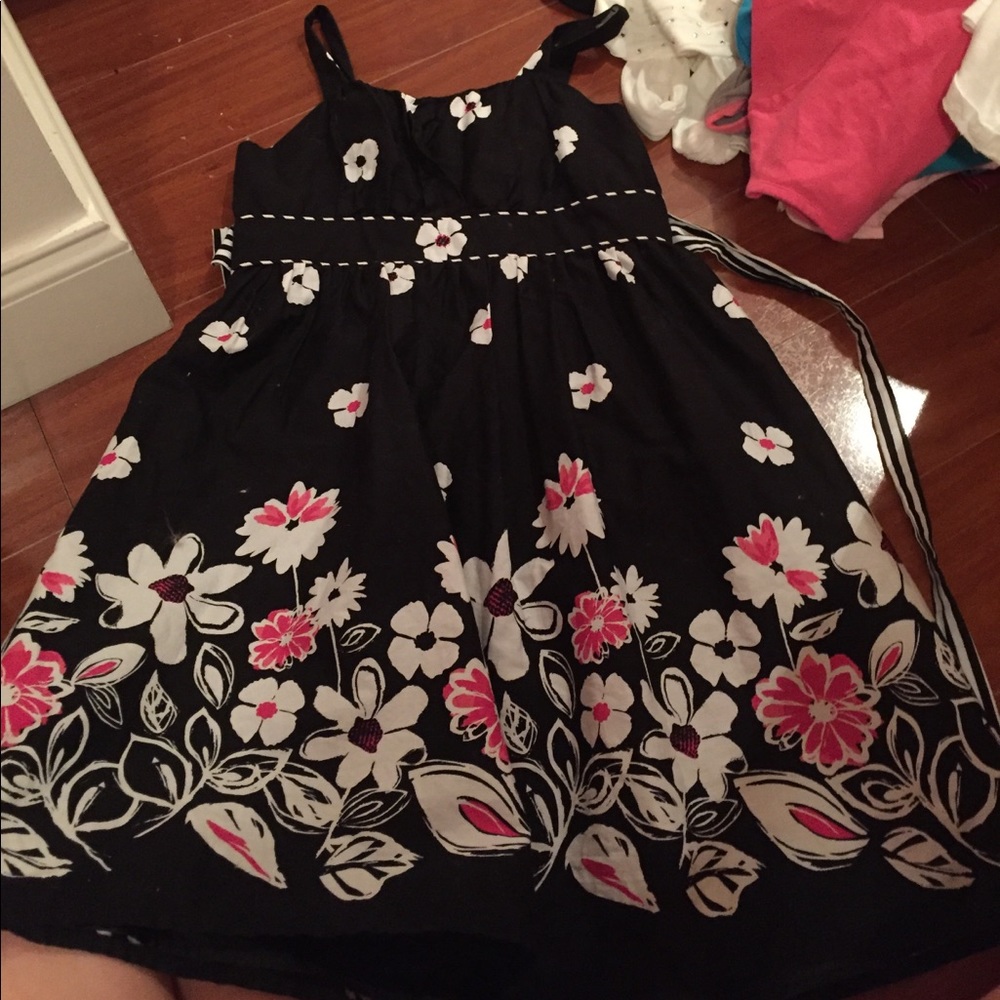Black children's dress with pink and white flowers