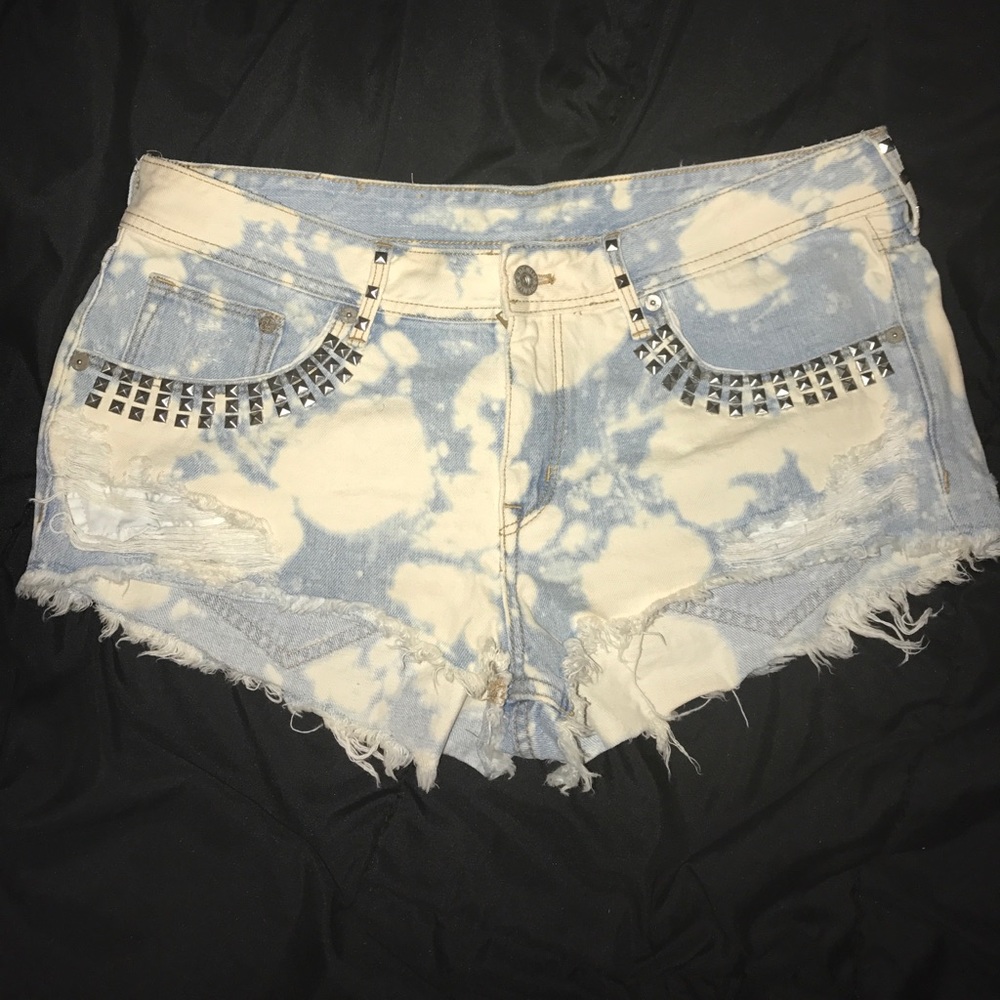 Distressed light wash bleached denim shorts