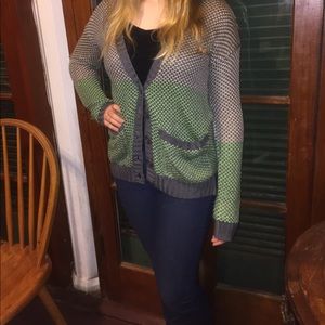Grey and green, button up, knit cardigan.
